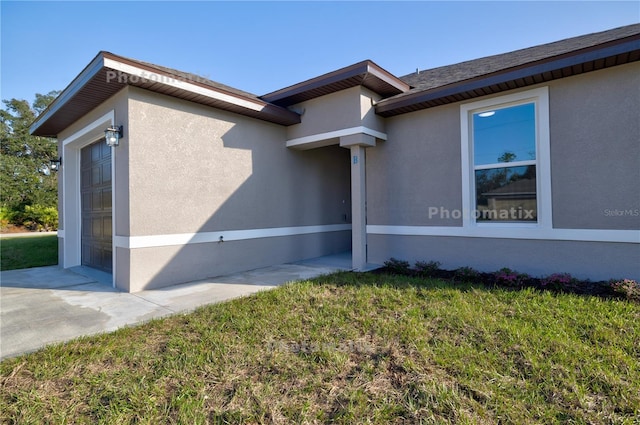 view of side of property with a yard