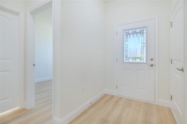 entrance foyer with light wood-type flooring