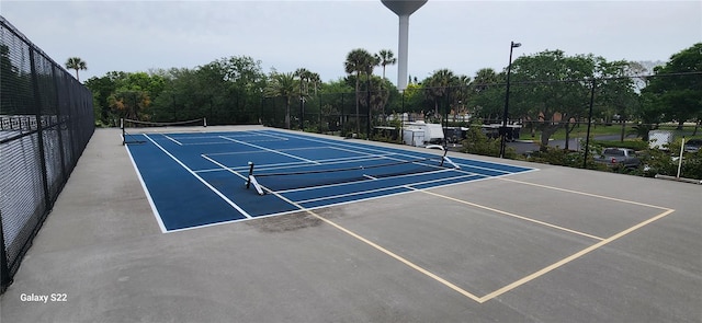 view of tennis court with basketball court