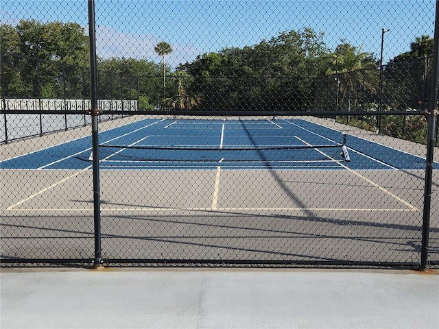 935 N Halifax Ave Unit 602, Daytona Beach, FL 32118 - view of tennis court featuring fence