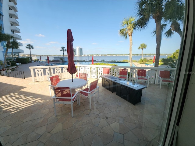 935 N Halifax Ave Unit 602, Daytona Beach, FL 32118 - view of patio / terrace featuring a water view
