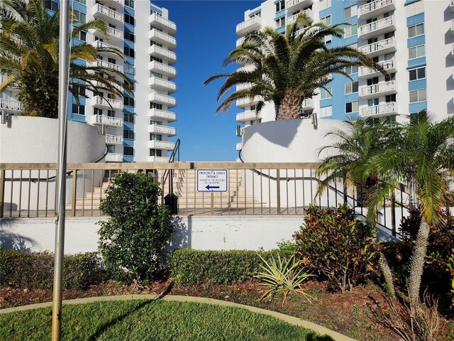 935 N Halifax Ave Unit 602, Daytona Beach, FL 32118 - view of building exterior with fence