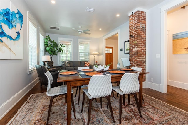 dining room featuring wood-type flooring and ceiling fan