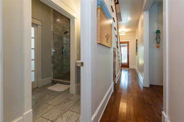 hallway featuring hardwood / wood-style flooring