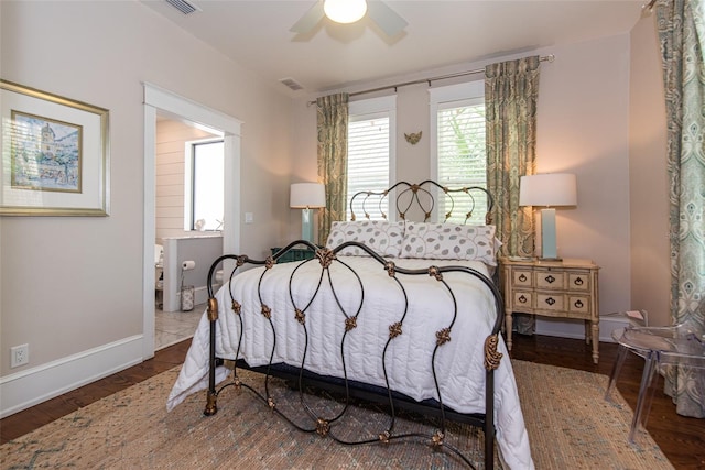 bedroom featuring dark hardwood / wood-style floors and ceiling fan