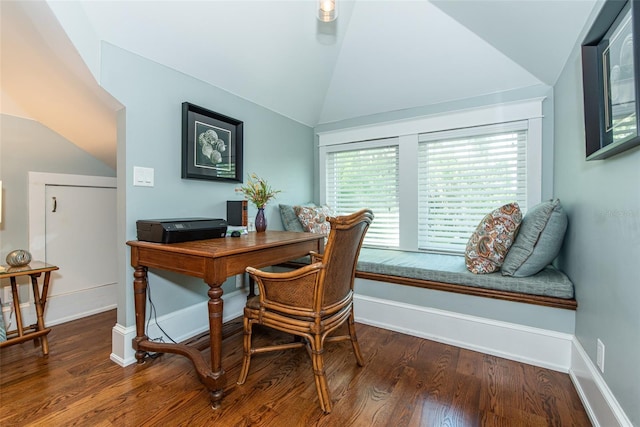 home office featuring dark hardwood / wood-style floors and lofted ceiling