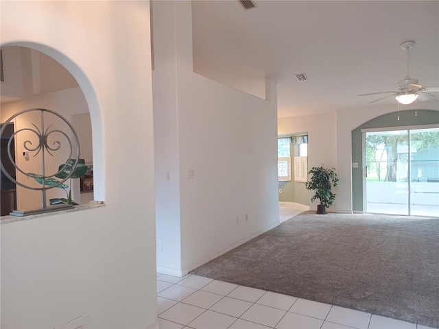 hallway with light carpet