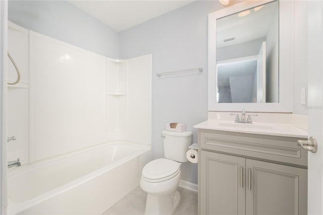 bathroom featuring bathtub / shower combination, vanity, toilet, and tile patterned floors