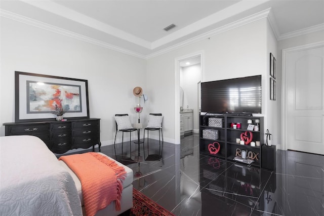 bedroom featuring connected bathroom and ornamental molding