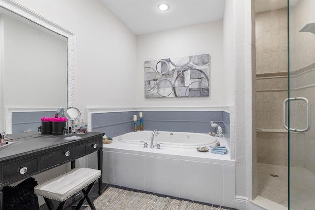 bathroom with tile patterned floors and separate shower and tub