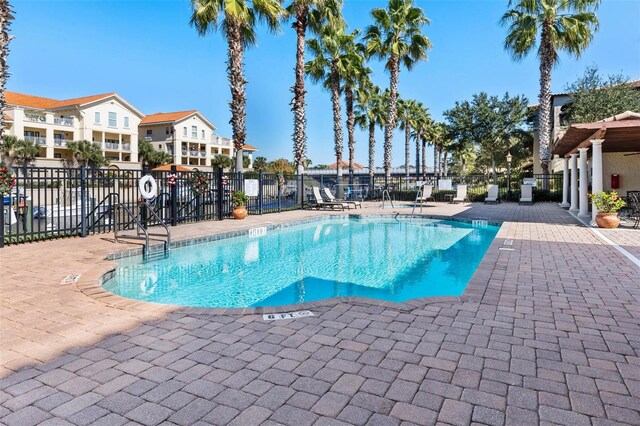 view of swimming pool featuring a patio