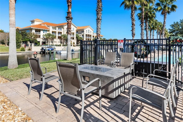 view of patio / terrace featuring a water view