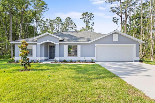 ranch-style house featuring a garage and a front lawn