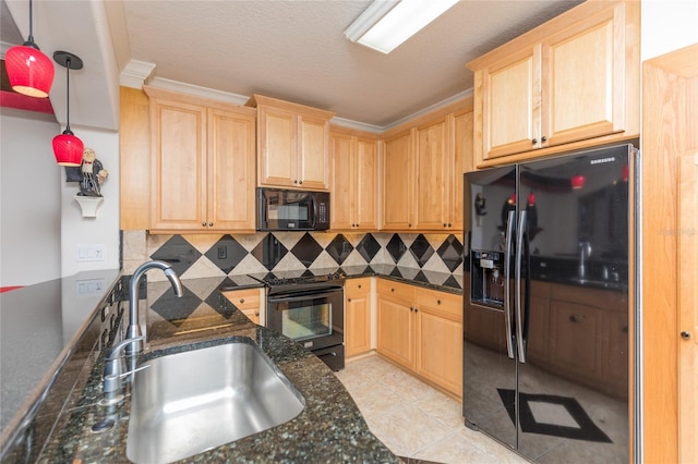 kitchen with sink, backsplash, pendant lighting, black appliances, and ornamental molding