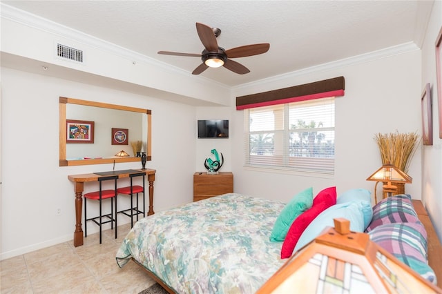 tiled bedroom with ceiling fan and ornamental molding