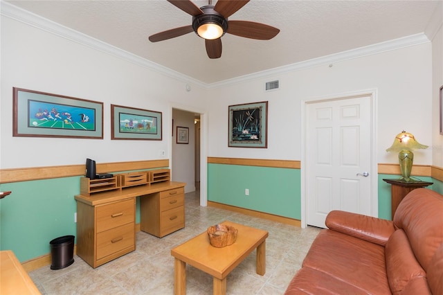 office space featuring crown molding and ceiling fan