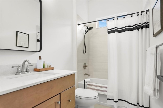 full bathroom with shower / bath combo with shower curtain, vanity, and toilet