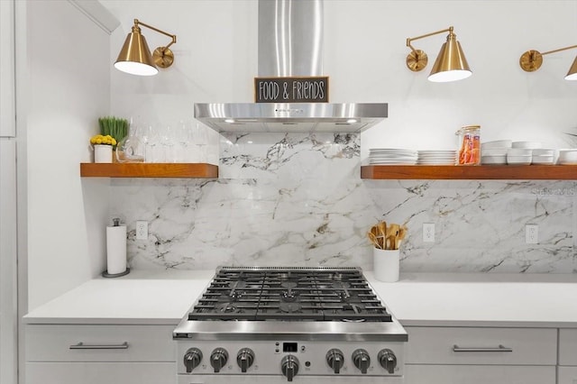 kitchen featuring backsplash, extractor fan, and stainless steel gas stovetop