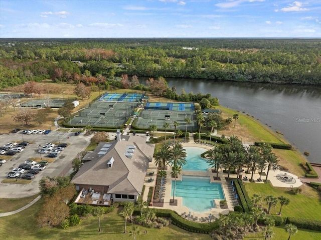 birds eye view of property featuring a water view