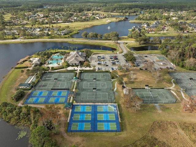 birds eye view of property featuring a water view