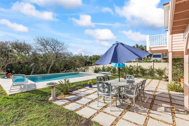 view of pool featuring a patio area