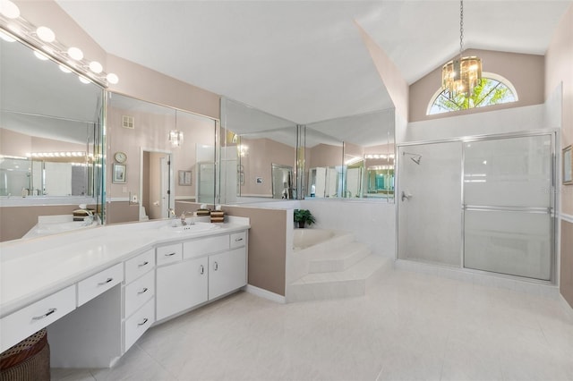 bathroom featuring independent shower and bath, tile patterned flooring, vaulted ceiling, and vanity