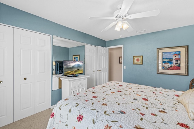 carpeted bedroom featuring ceiling fan