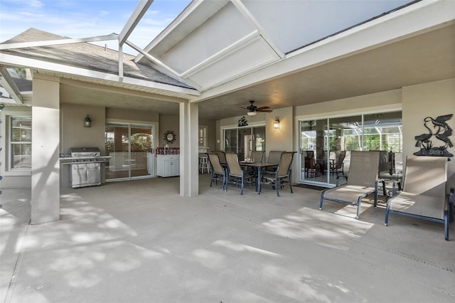 view of patio featuring ceiling fan and grilling area