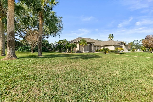 view of front of home featuring a front lawn