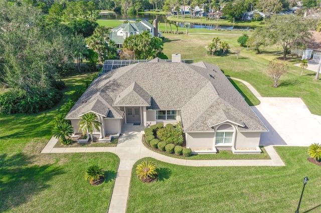 birds eye view of property featuring a water view