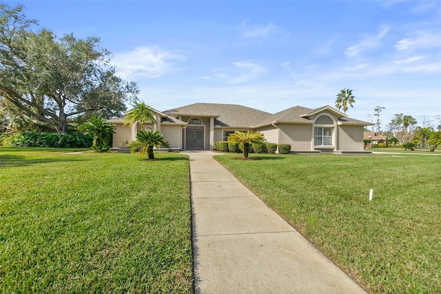 ranch-style home featuring a front yard