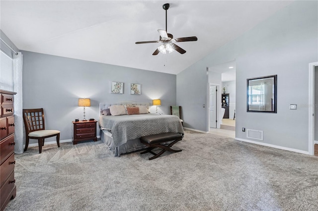 bedroom with ceiling fan, light carpet, and lofted ceiling