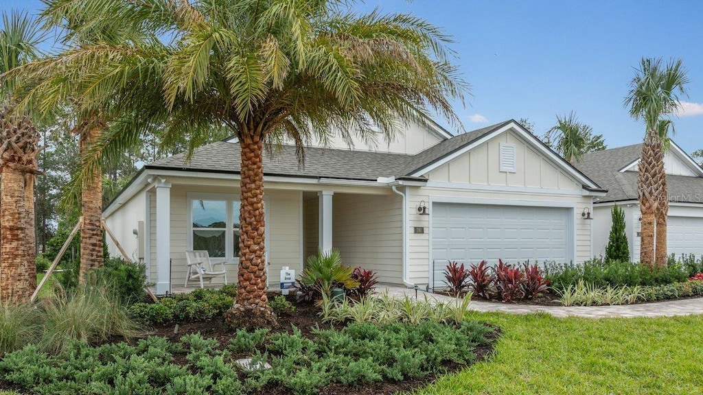 view of front of property featuring a garage