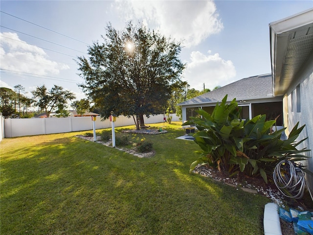 view of yard with fence