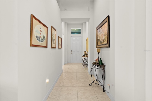 hallway with light tile patterned floors