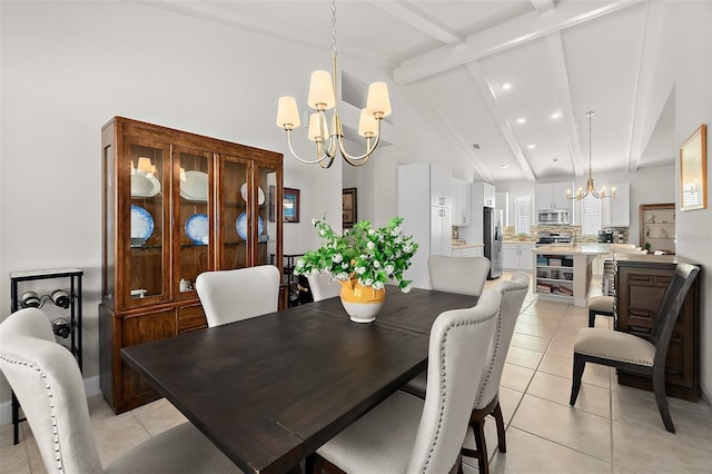 tiled dining area featuring a notable chandelier, beam ceiling, and high vaulted ceiling