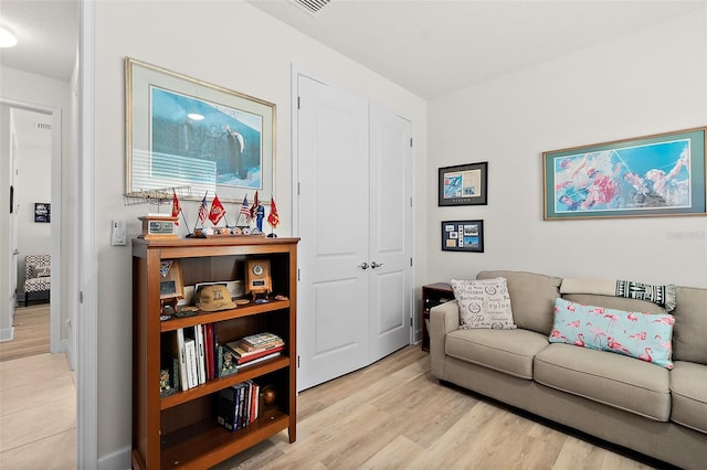 sitting room featuring light wood-type flooring