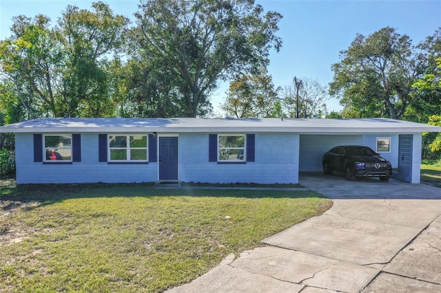 ranch-style home with a front lawn and a carport