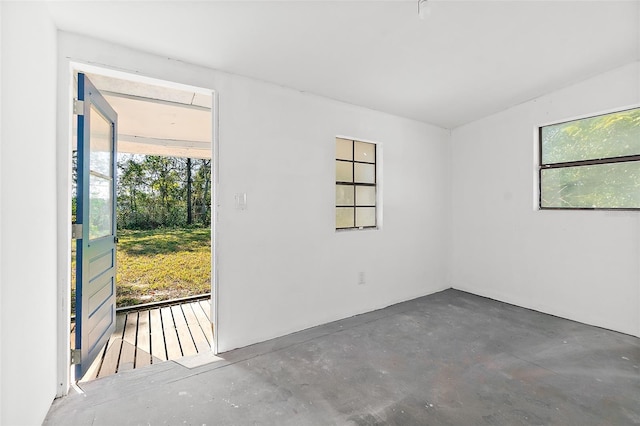 unfurnished room featuring a healthy amount of sunlight