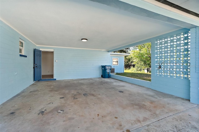 view of patio featuring a carport