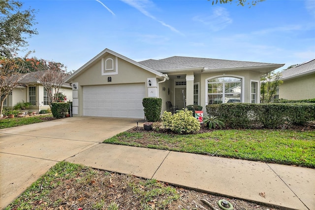 single story home with a garage