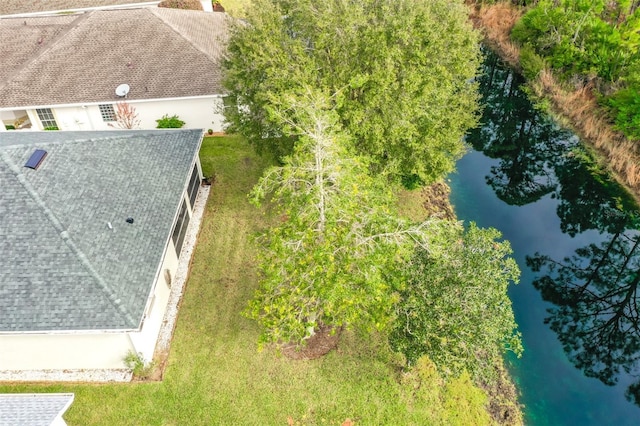 drone / aerial view featuring a water view