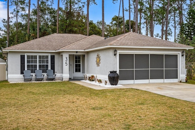 ranch-style home with a garage and a front yard