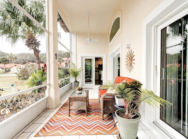 sunroom / solarium with ceiling fan