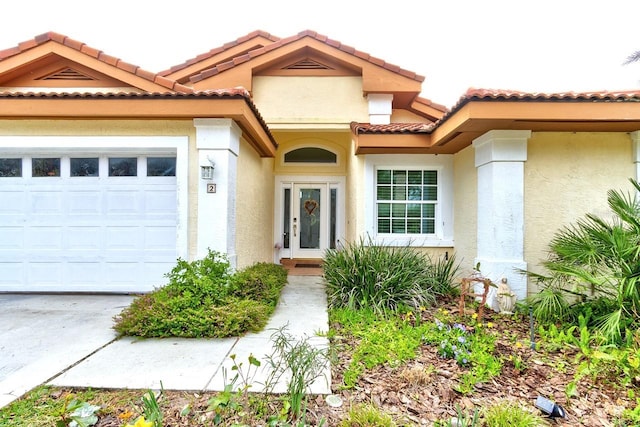 mediterranean / spanish-style house featuring a garage