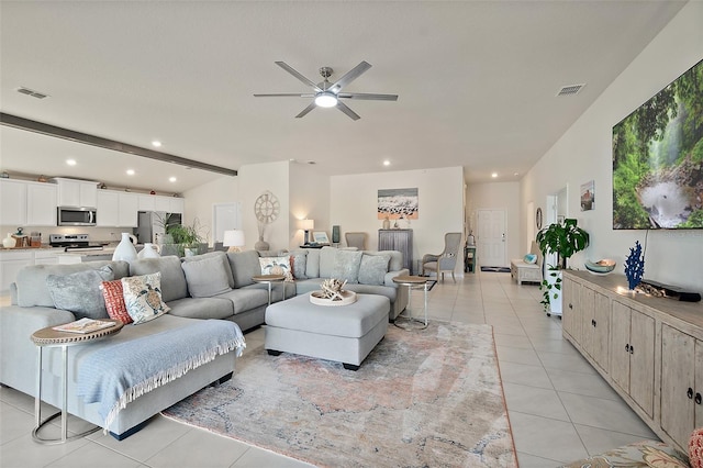 tiled living room with beamed ceiling and ceiling fan