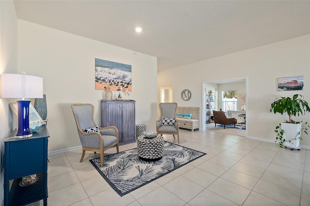 sitting room with light tile patterned flooring