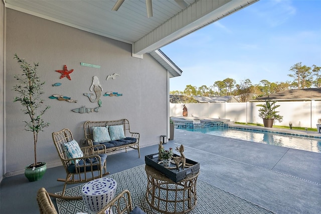 view of patio with a fenced in pool