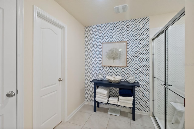 bathroom featuring tile patterned floors and walk in shower