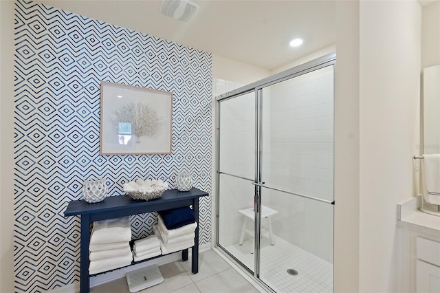 bathroom featuring tile patterned flooring and walk in shower